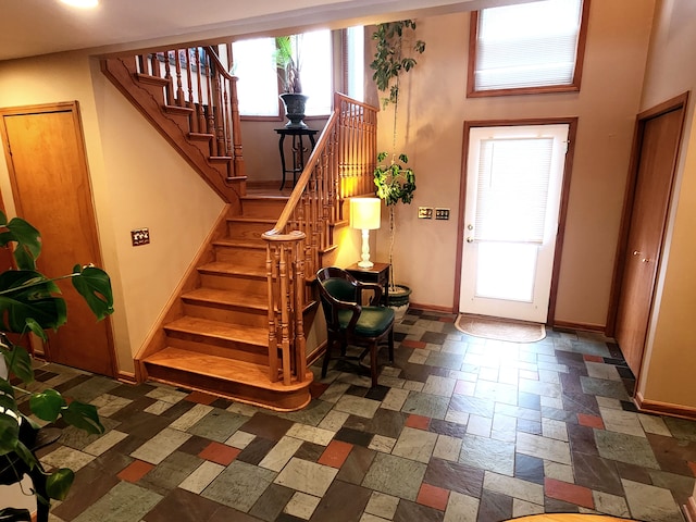 foyer entrance featuring a healthy amount of sunlight