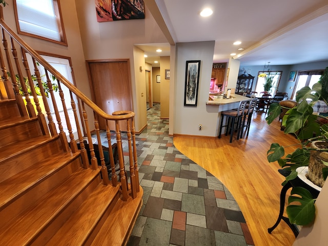 foyer entrance with light hardwood / wood-style floors