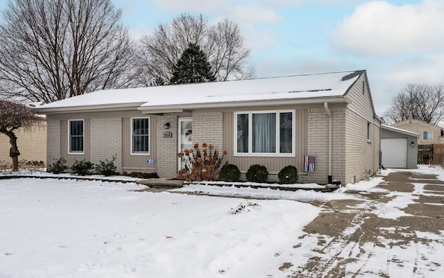 single story home with a garage