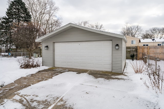 view of snow covered garage