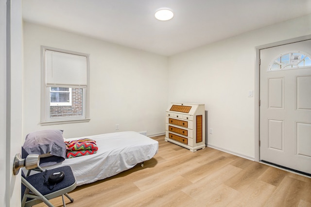 bedroom featuring hardwood / wood-style flooring