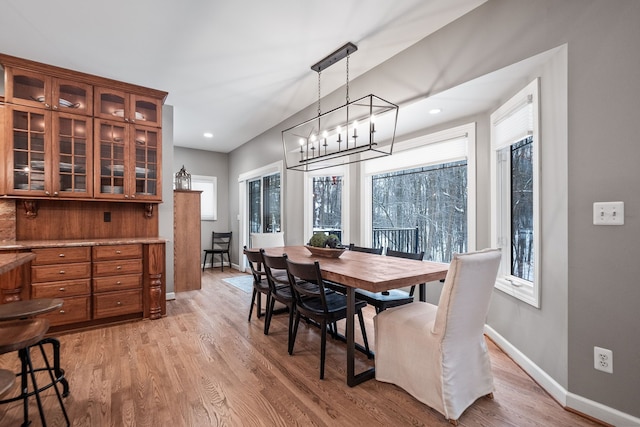 dining room with light hardwood / wood-style flooring