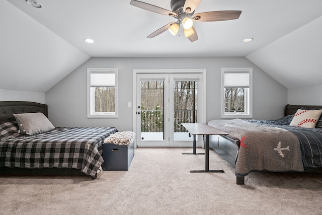 bedroom featuring ceiling fan, access to exterior, carpet floors, and lofted ceiling