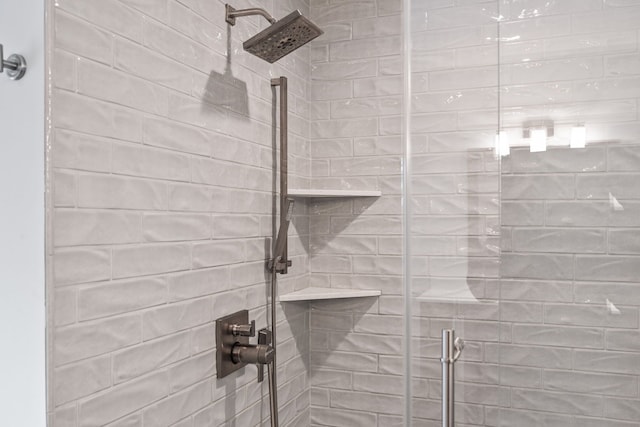 room details featuring an enclosed shower