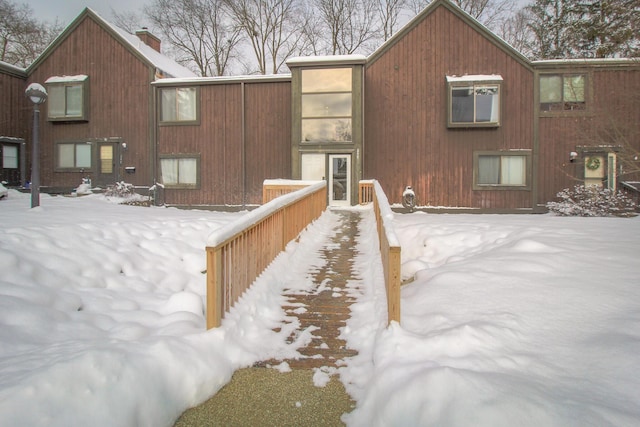 view of snow covered property