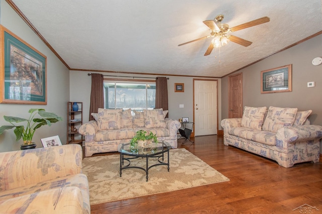 living room featuring ceiling fan, wood-type flooring, vaulted ceiling, and a textured ceiling