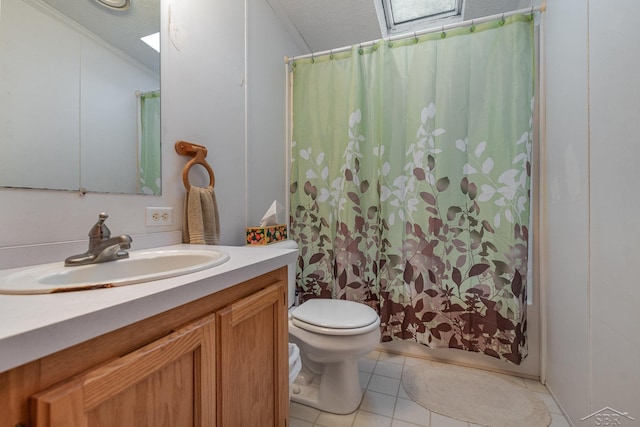 bathroom with vanity, ornamental molding, a shower with curtain, and tile patterned flooring