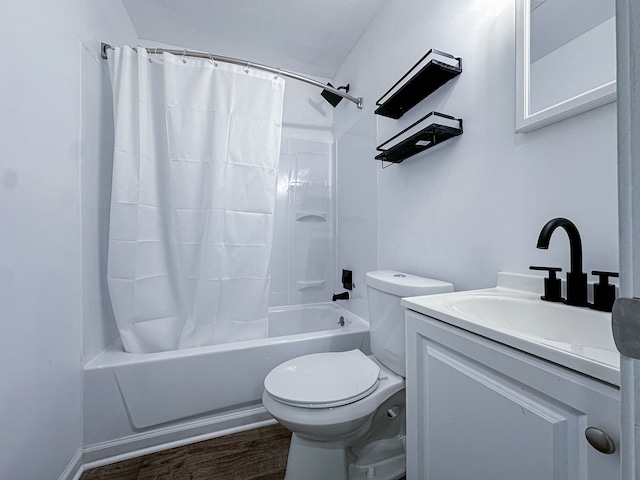 full bathroom with shower / bath combo with shower curtain, hardwood / wood-style flooring, vanity, and toilet