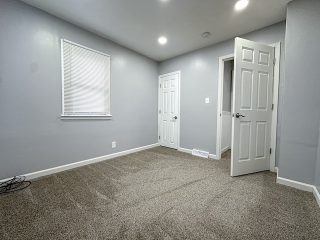 view of carpeted spare room