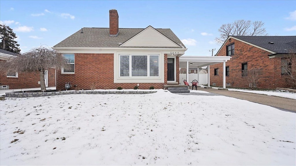 view of snow covered property