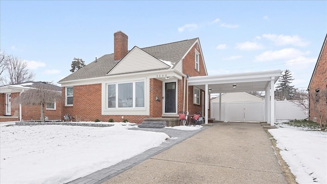 view of front of home featuring a carport