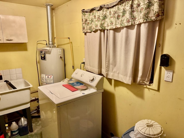 laundry room featuring washer / clothes dryer, water heater, and sink