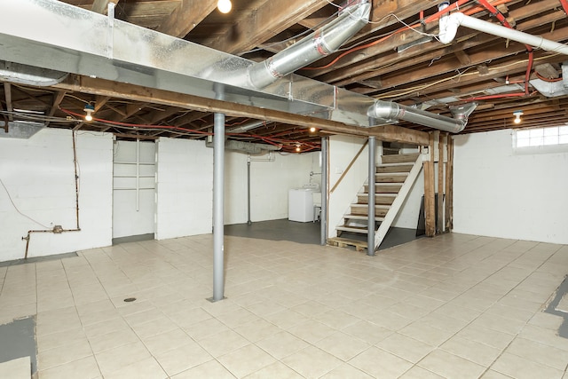 basement with washer / dryer