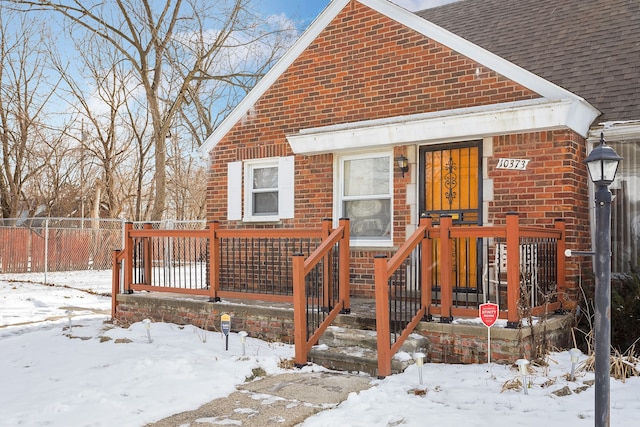 view of snow covered property