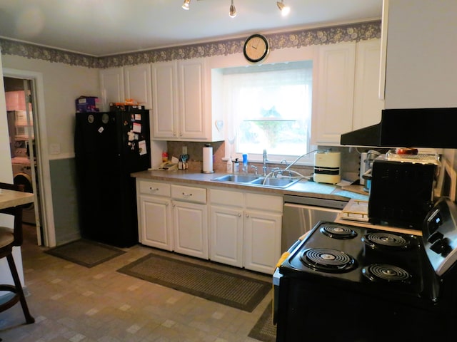 kitchen featuring sink, white cabinets, and black appliances