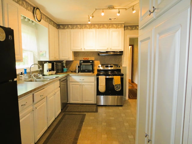 kitchen featuring sink, white cabinetry, and black appliances