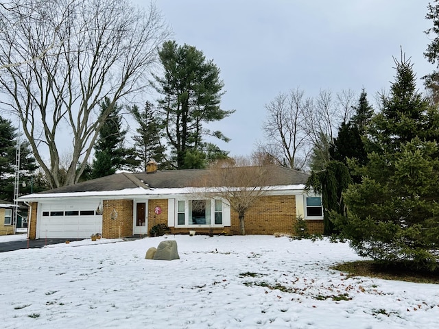 single story home with a garage