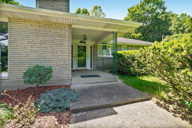 property entrance featuring covered porch