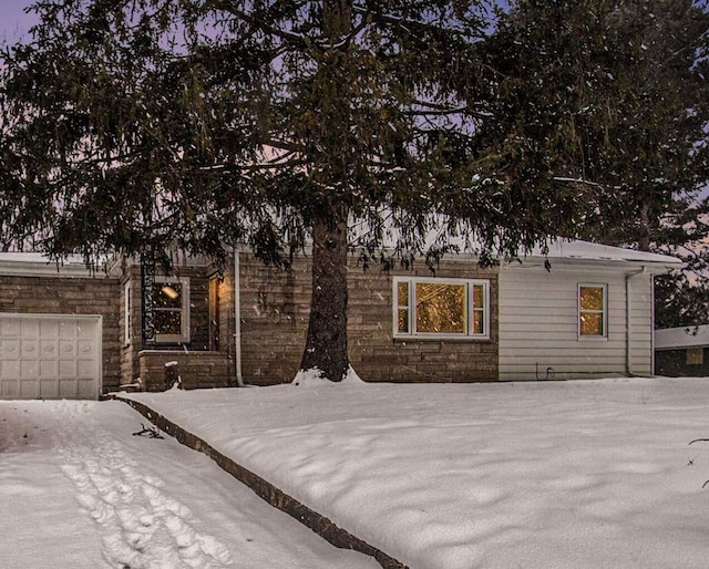 view of front of home with a garage