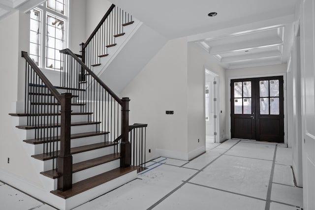 tiled entrance foyer with french doors