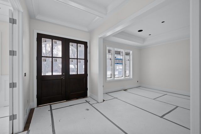 foyer entrance with french doors and ornamental molding