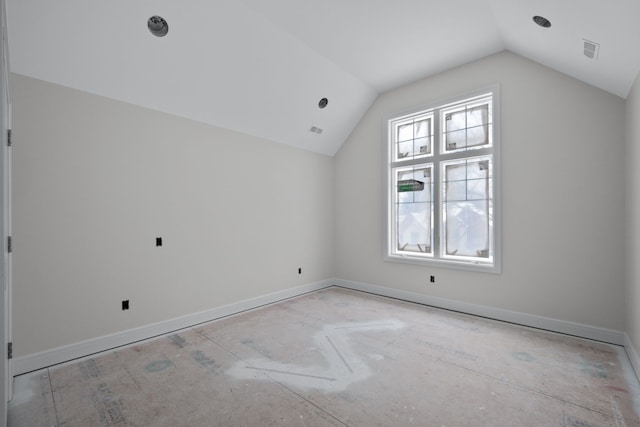 bonus room with vaulted ceiling