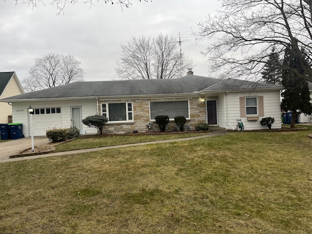 ranch-style house featuring a garage and a front lawn