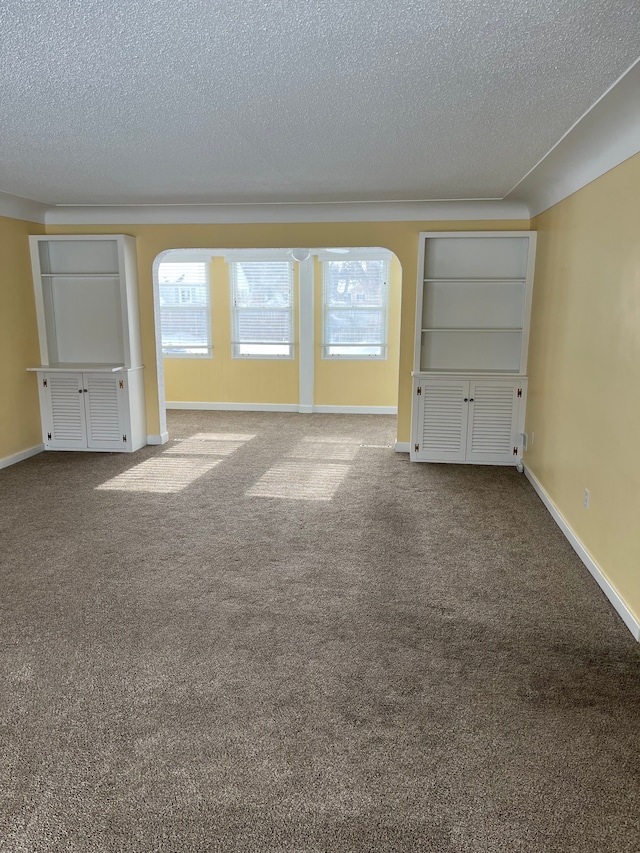 interior space featuring a textured ceiling