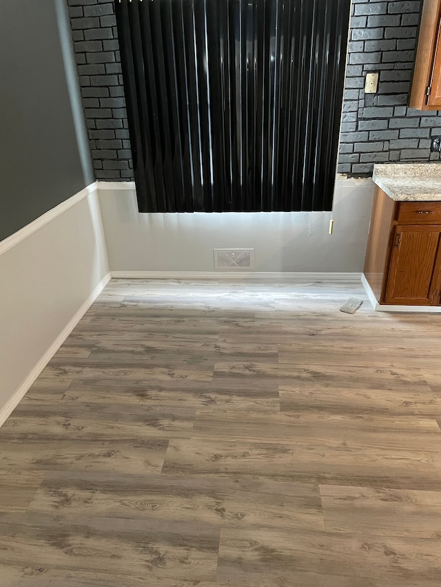 interior details featuring hardwood / wood-style floors