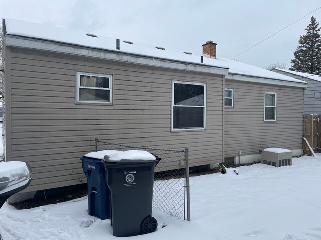 view of snow covered property