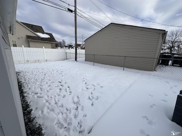 view of yard covered in snow