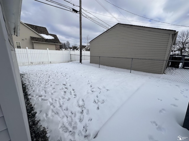 view of yard covered in snow