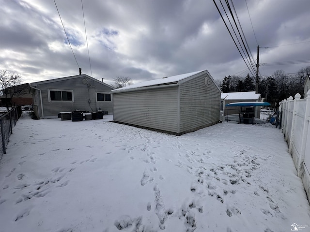 view of snow covered house