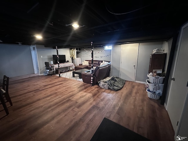 basement with wood-type flooring