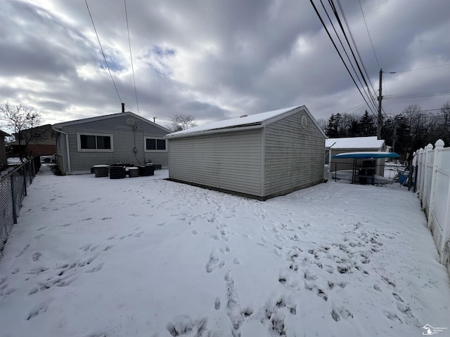 view of snow covered house