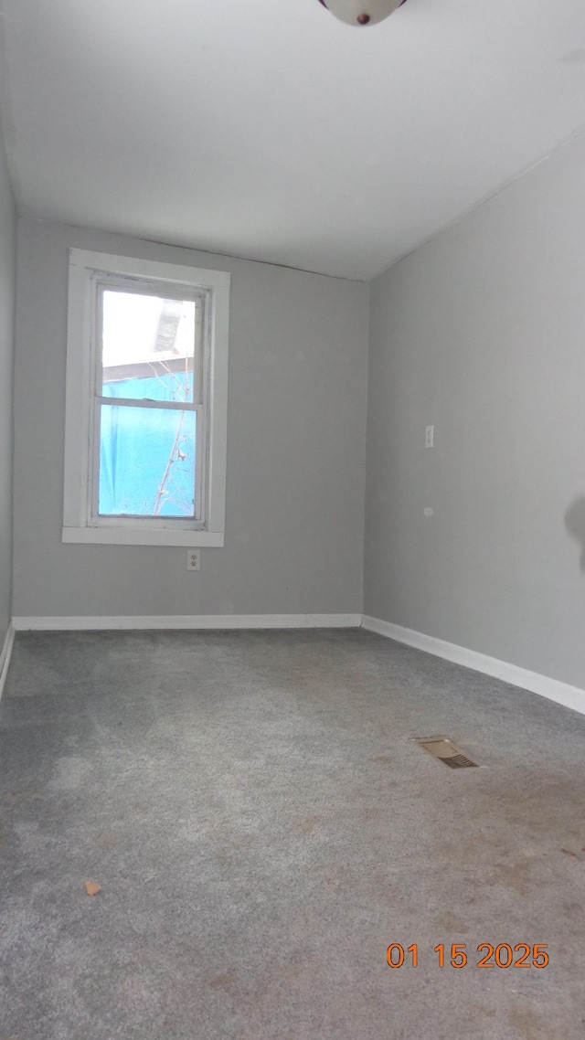 view of carpeted spare room