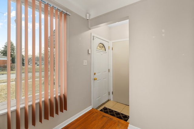 entryway featuring light tile patterned flooring