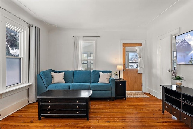 living room featuring dark hardwood / wood-style floors