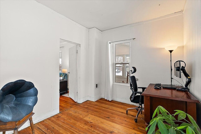 home office featuring light hardwood / wood-style flooring