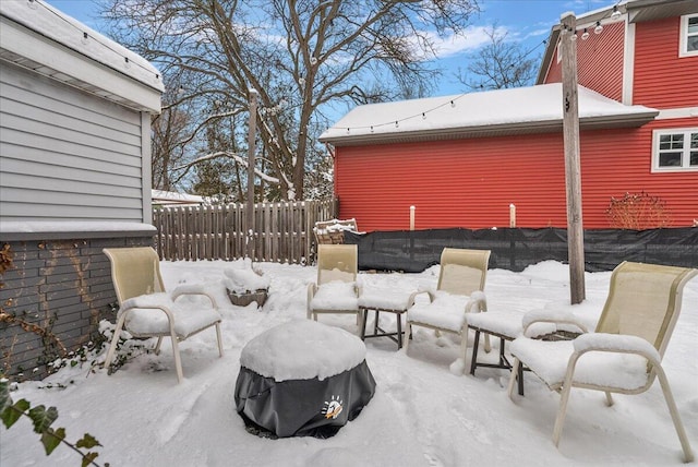 view of snow covered patio