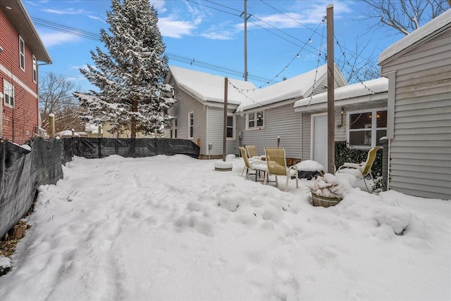 view of yard layered in snow