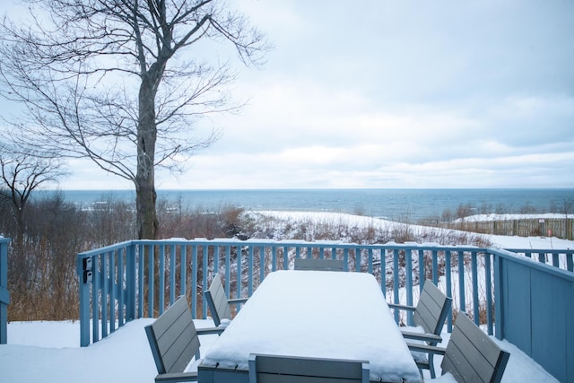 view of snow covered deck