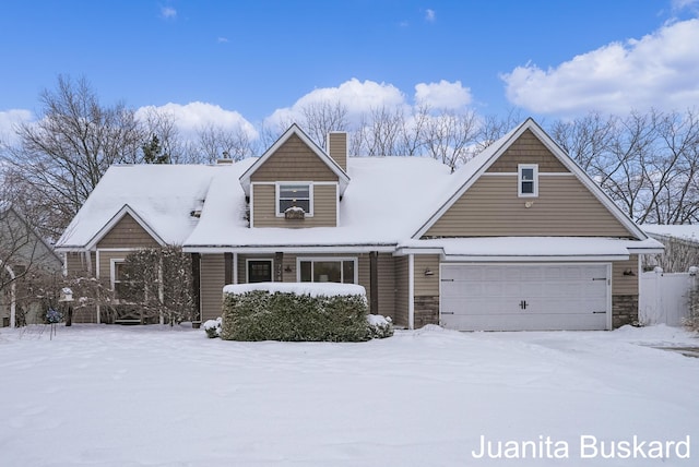 view of front of home with a garage