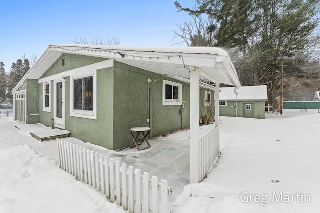 exterior space with an outbuilding