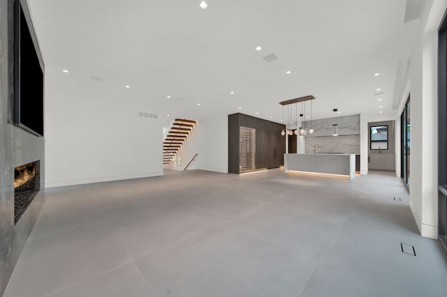 unfurnished living room with a fireplace