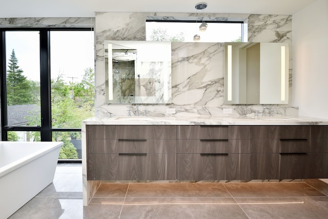 bathroom featuring vanity and a bathtub