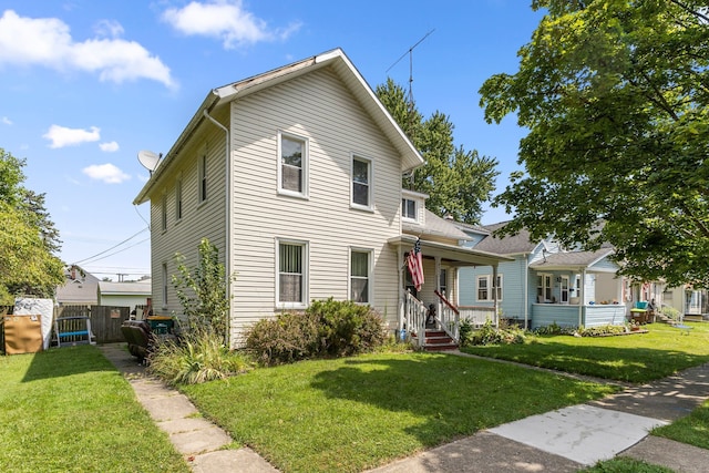 view of front of house with a front lawn