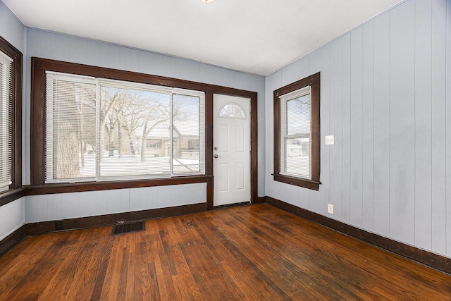 interior space with dark wood-type flooring