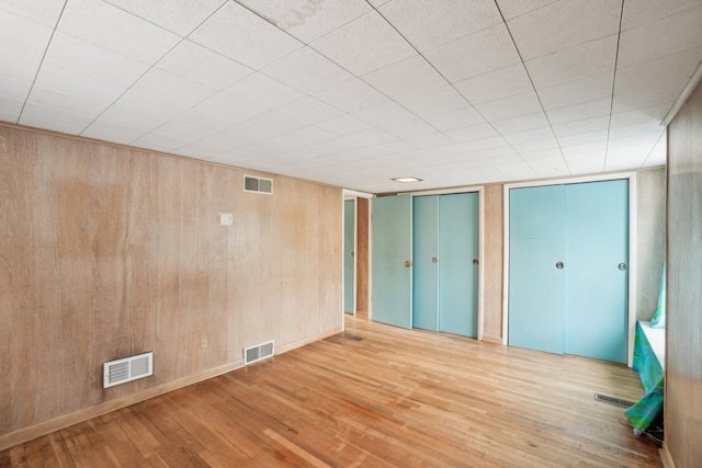 unfurnished bedroom featuring hardwood / wood-style flooring