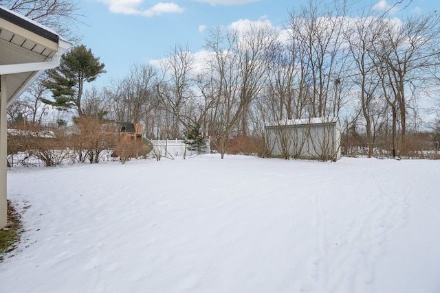 view of yard covered in snow